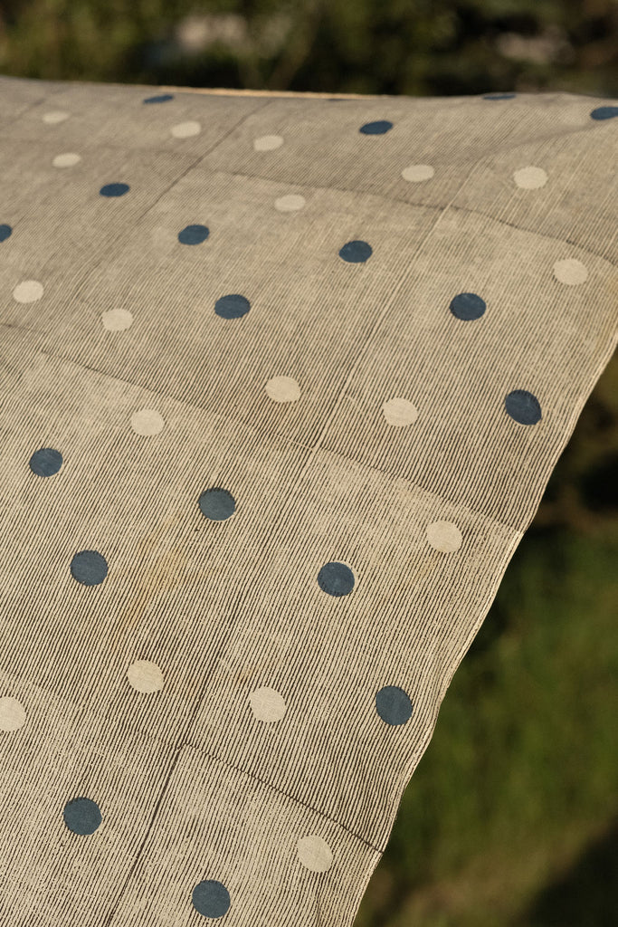 White bandana with scattered blue dot pattern by World of Crow - vintage cotton handkerchief for head wrap and styling.