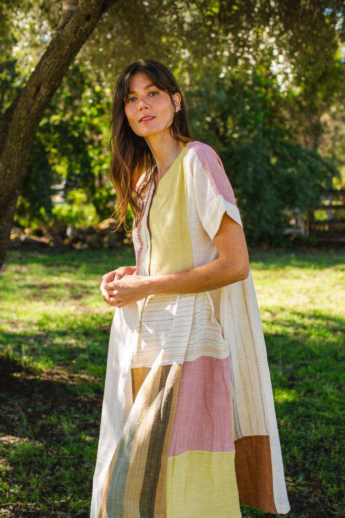 This dress is made in collaboration between Erica Kim @ahistoryofarchitecture and World of Crow, This dress has woven patches of different desert colors, it is made with handwoven fabric