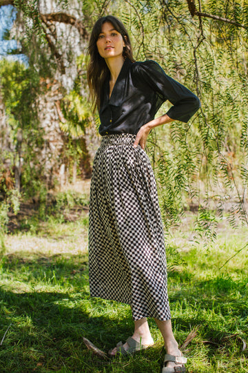Checkered block printed, black and white skirt, ankle length, this skirt is made in collaboration between Erica Kim and World of Crow, smocked elasticated waist, sustainably made